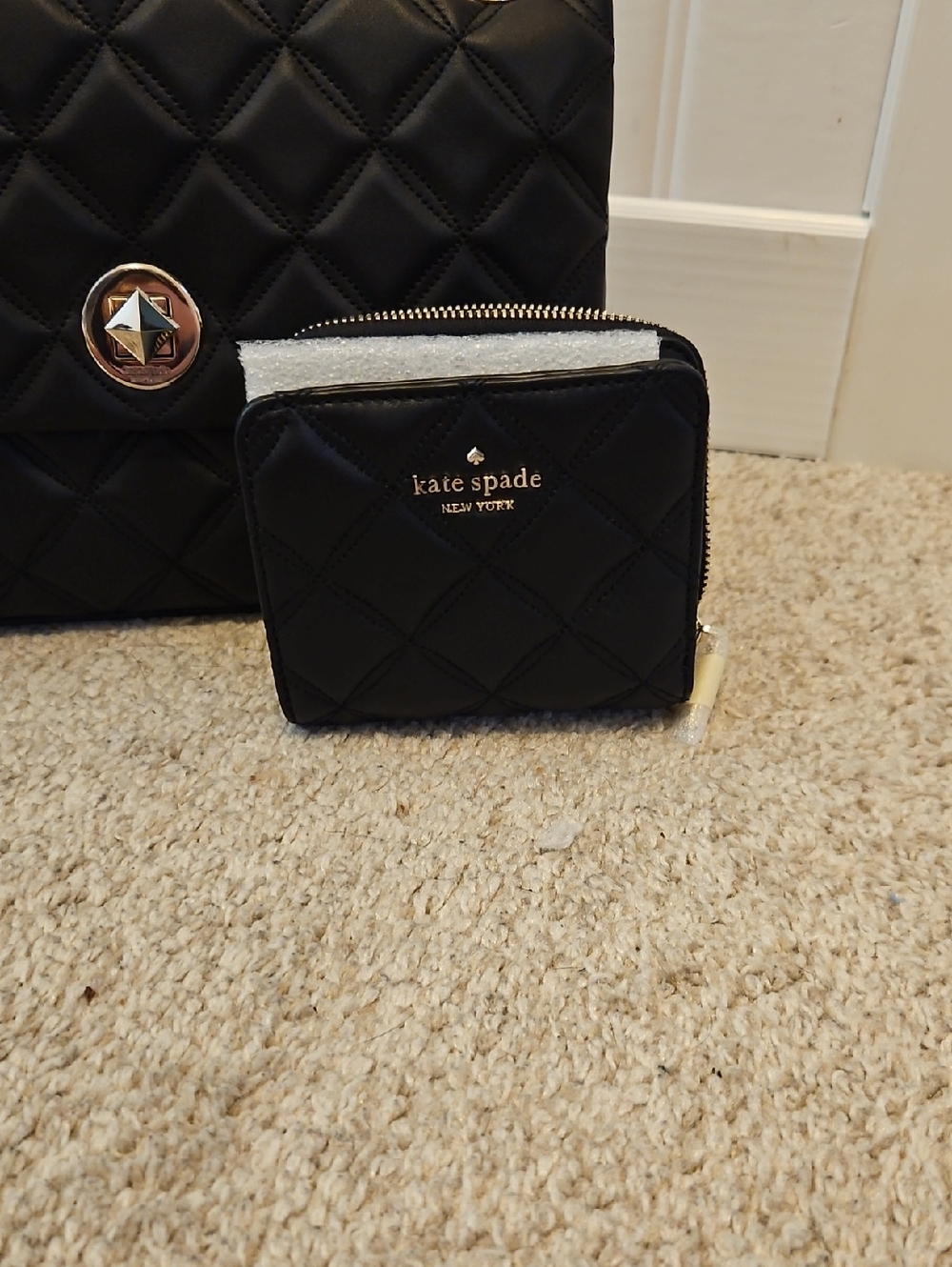 kate spade Black Quilted Zip-Around Mini Wallet